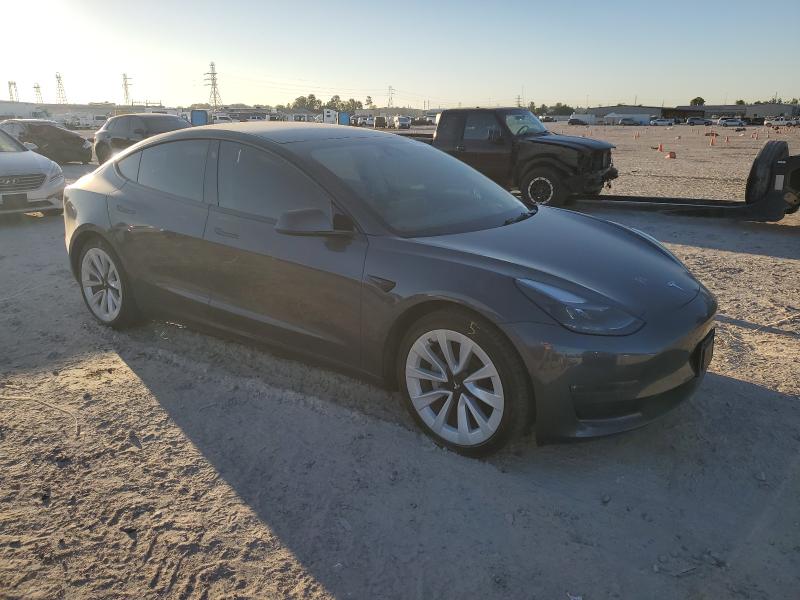 Photo 4 from auction – 2022 TESLA MODEL 3 with VIN 5YJ3E1EB0NF128486