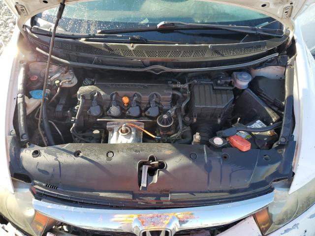 Photo 11 from auction – 2011 HONDA CIVIC LX with VIN 2HGFA1F50BH521736