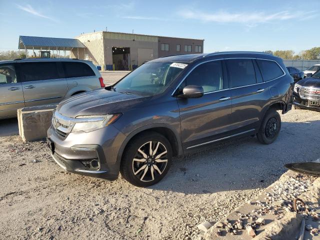 HONDA PILOT TOUR 2020 with VIN 5FNYF5H65LB021603 - Photo from auction