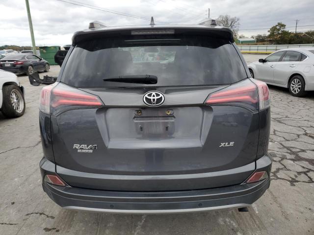 Photo 6 from auction – 2017 TOYOTA RAV4 XLE with VIN JTMWFREV6HD099722
