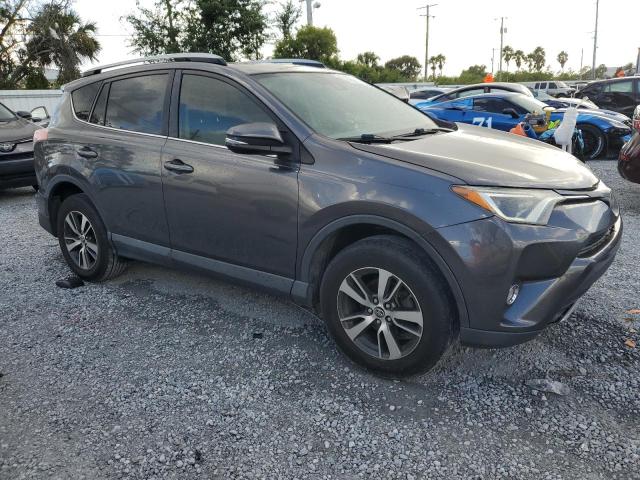Photo 4 from auction – 2017 TOYOTA RAV4 XLE with VIN JTMWFREV0HJ142114