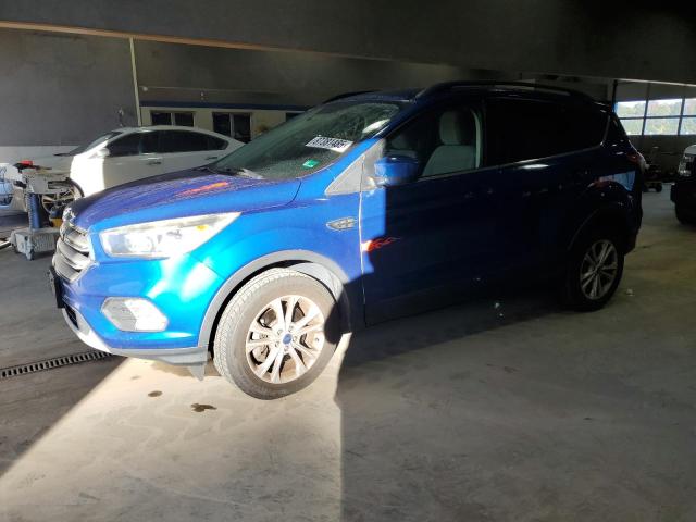 FORD ESCAPE SE 2018 with VIN 1FMCU9GD8JUC38389 - Photo from auction