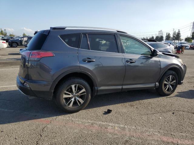 Photo 3 from auction – 2016 TOYOTA RAV4 XLE with VIN JTMWFREVXGD084851