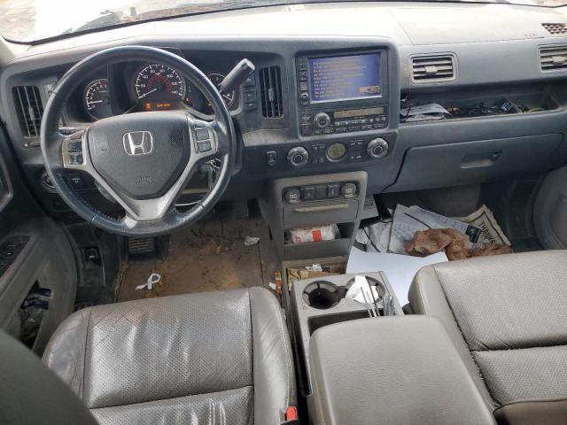 Photo 8 from auction – 2010 HONDA RIDGELINE with VIN 5FPYK1F53AB009274