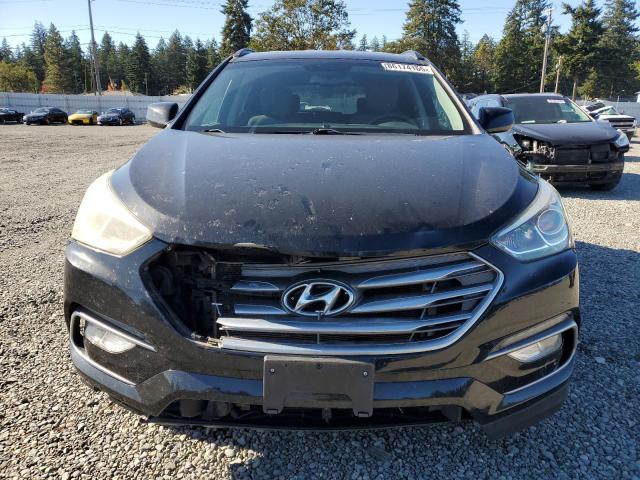 Photo 5 from auction – 2017 HYUNDAI SANTA FE S with VIN 5NMZU3LB0HH029357