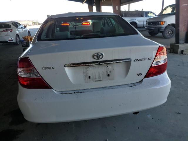 Photo 6 from auction – 2004 TOYOTA CAMRY LE with VIN 4T1BF30K04U077293
