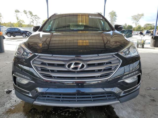 Photo 5 from auction – 2017 HYUNDAI SANTA FE S with VIN 5NMZU3LB8HH014752