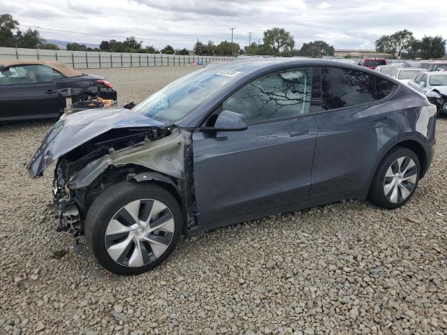 TESLA MODEL Y 2023 with VIN 7SAYGAEE4PF962275 - Photo from auction