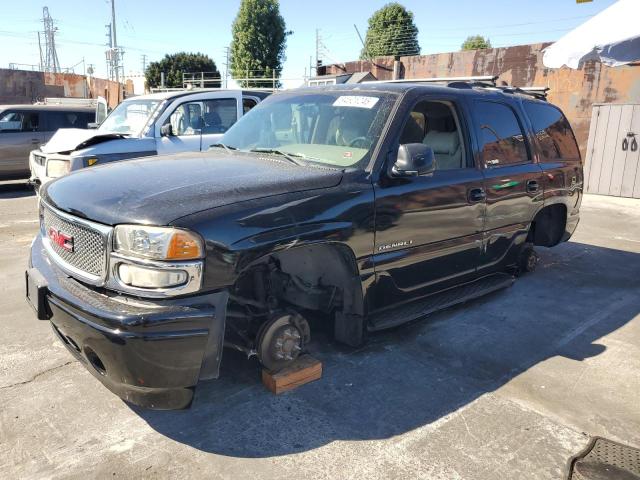 GMC DENALI 2001 with VIN 1GKEK63U31J310385 - Photo from auction