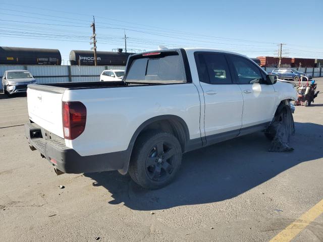 Photo 3 from auction – 2024 HONDA RIDGELINE with VIN 5FPYK3F82RB026617