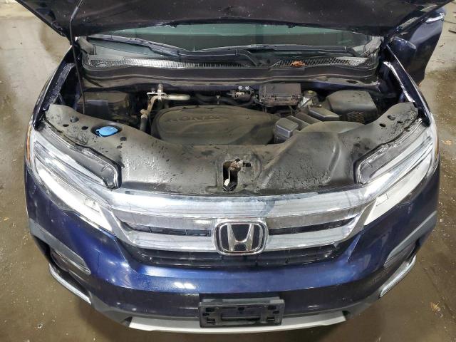 Photo 12 from auction – 2022 HONDA PILOT TOUR with VIN 5FNYF6H95NB034032