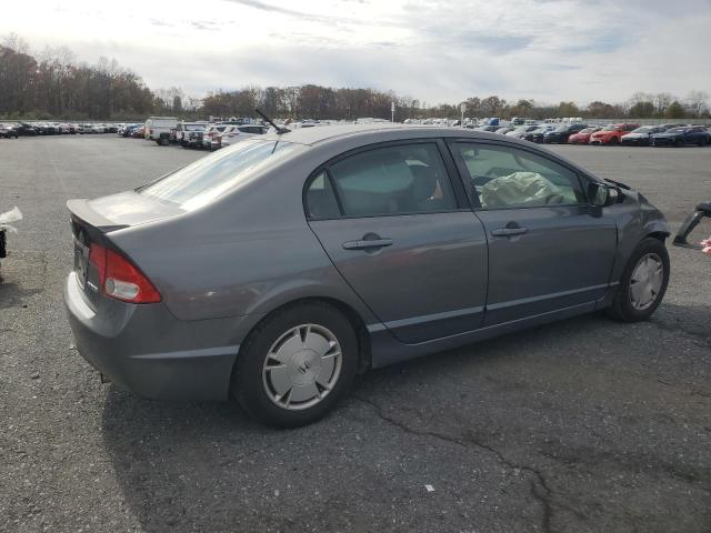 Photo 3 from auction – 2009 HONDA CIVIC HYBR with VIN JHMFA36259S010671