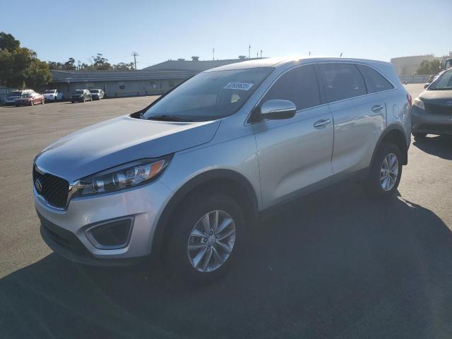 KIA SORENTO LX 2016 with VIN 5XYPG4A32GG077628 - Photo from auction