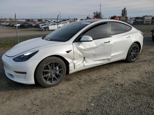 TESLA MODEL 3 2022 with VIN 5YJ3E1EB7NF183694 - Photo from auction