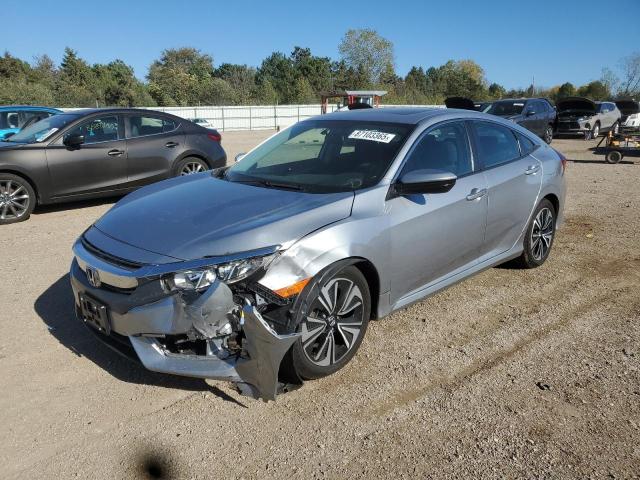 Photo 1 from auction – 2016 HONDA CIVIC EX with VIN 19XFC1F3XGE018631