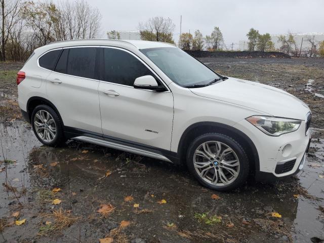 Photo 4 from auction – 2017 BMW X1 XDRIVE2 with VIN WBXHT3C32H5F80938
