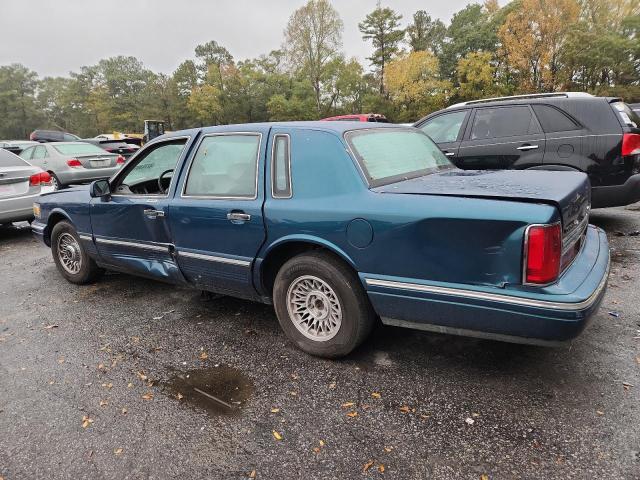 Photo 2 from auction – 1997 LINCOLN TOWN CAR E with VIN 1LNLM81W0VY679579