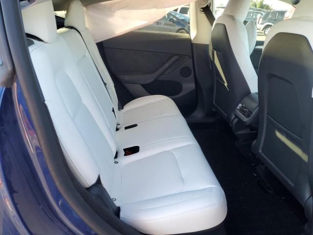 Photo 11 from auction – 2023 TESLA MODEL Y with VIN 7SAYGDEE9PF622783