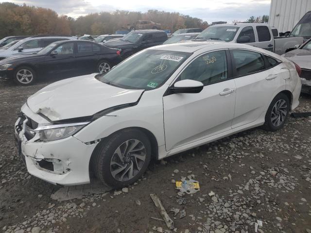 HONDA CIVIC EX 2018 with VIN 19XFC2F78JE207021 - Photo from auction