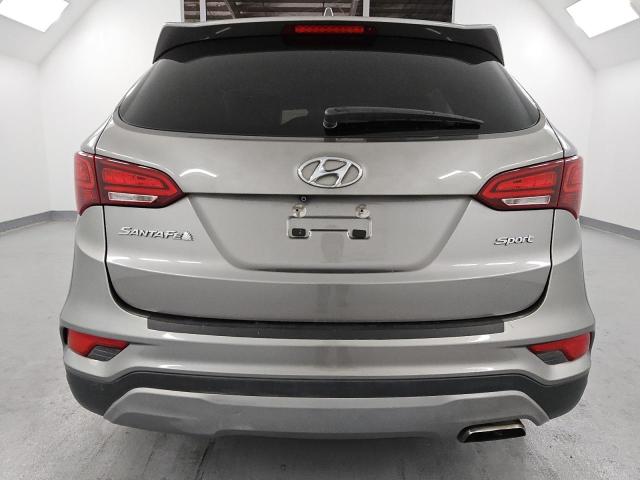 Photo 6 from auction – 2017 HYUNDAI SANTA FE S with VIN 5NMZU3LB2HH016304