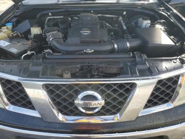 Photo 11 from auction – 2005 NISSAN FRONTIER K with VIN 1N6AD06U75C448435