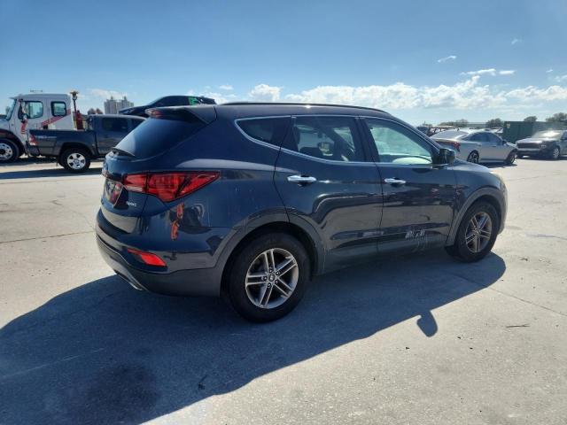 Photo 3 from auction – 2017 HYUNDAI SANTA FE S with VIN 5NMZU3LBXHH011318