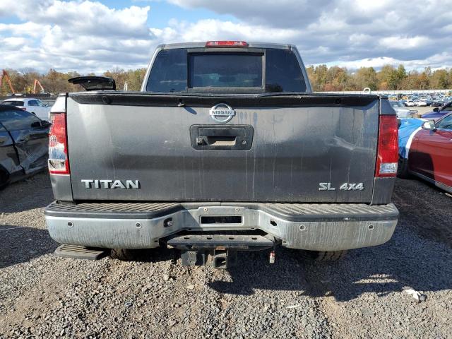 Foto 6 de la subasta – 2014 NISS TITAN con VIN 1N6AA0EC2EN505209