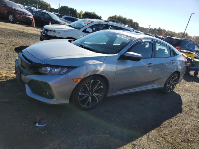 HONDA CIVIC 2017 with VIN 2HGFC1E52HH700591 - Photo from auction
