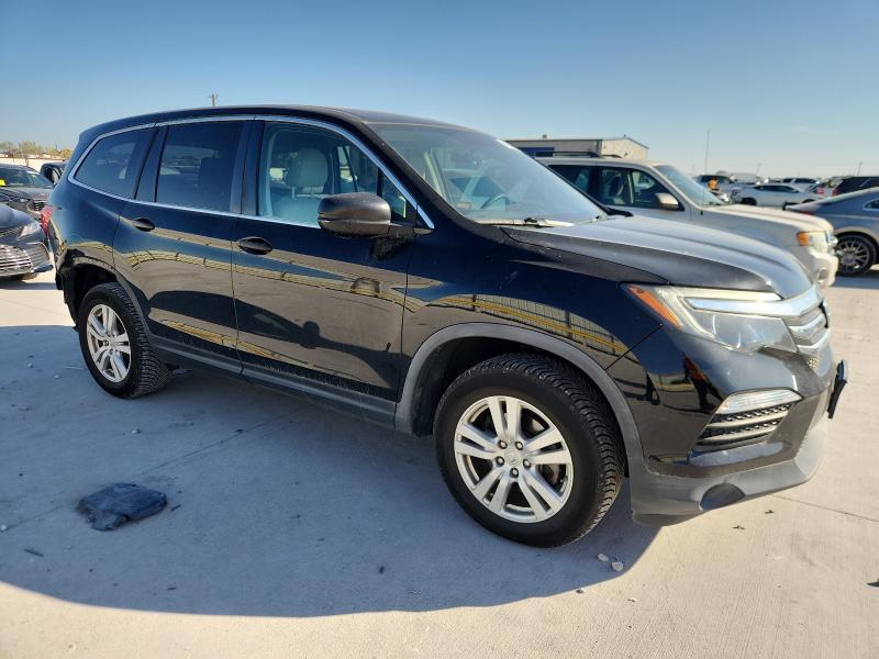 Photo 4 from auction – 2018 HONDA PILOT LX with VIN 5FNYF5H18JB013349