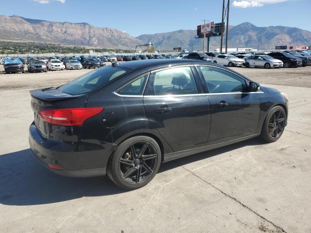 Photo 3 from auction – 2015 FORD FOCUS with VIN 1FADP3J24FL281084