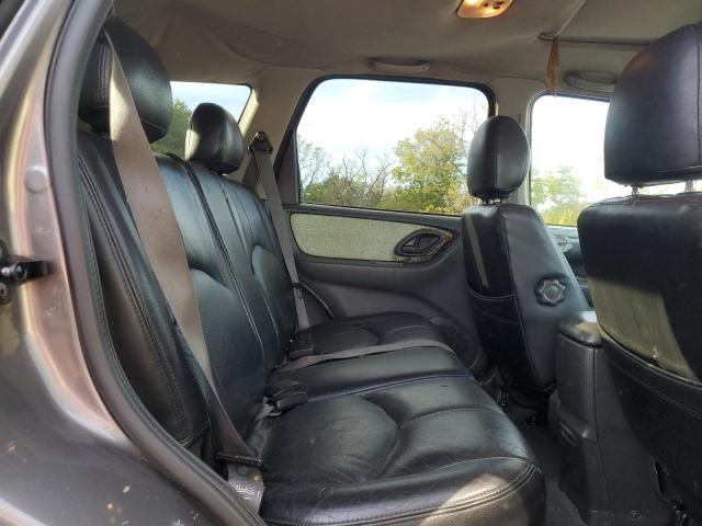 Photo 11 from auction – 2003 MAZDA TRIBUTE LX with VIN 4F2YZ04173KM46571