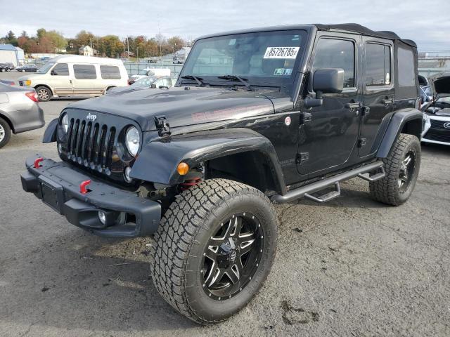 JEEP WRANGLER U 2015 with VIN 1C4HJWFG5FL710574 - Photo from auction