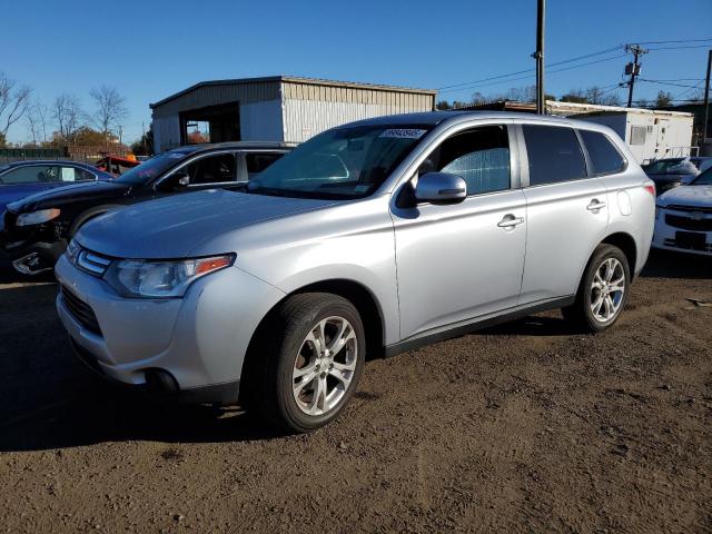 MITSUBISHI OUTLANDER 2014 with VIN JA4AZ3A34EZ019880 - Photo from auction
