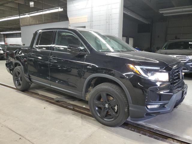 Photo 4 from auction – 2022 HONDA RIDGELINE with VIN 5FPYK3F85NB004461