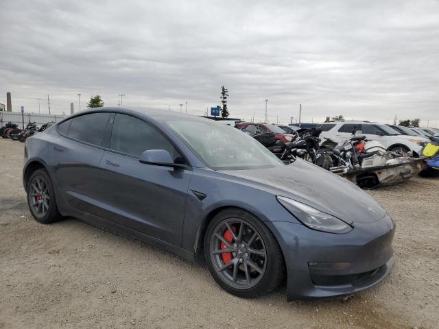 Photo 4 from auction – 2021 TESLA MODEL 3 with VIN 5YJ3E1EB8MF099883