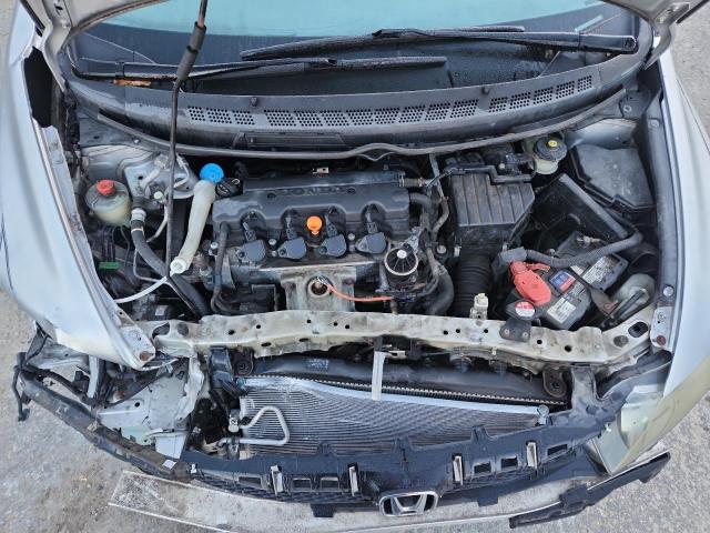 Photo 11 from auction – 2011 HONDA CIVIC LX with VIN 19XFA1F53BE034587