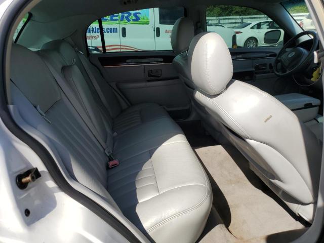 Photo 10 from auction – 2004 LINCOLN TOWN CAR E with VIN 1LNHM81W14Y633747