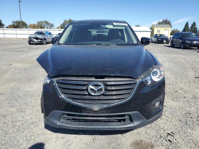 Photo 5 from auction – 2016 MAZDA CX-5 TOURING with VIN JM3KE2CY7G0838356