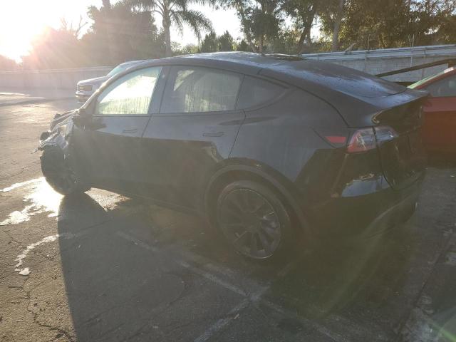 Photo 2 from auction – 2022 TESLA MODEL Y with VIN 7SAYGDEE6NF481880