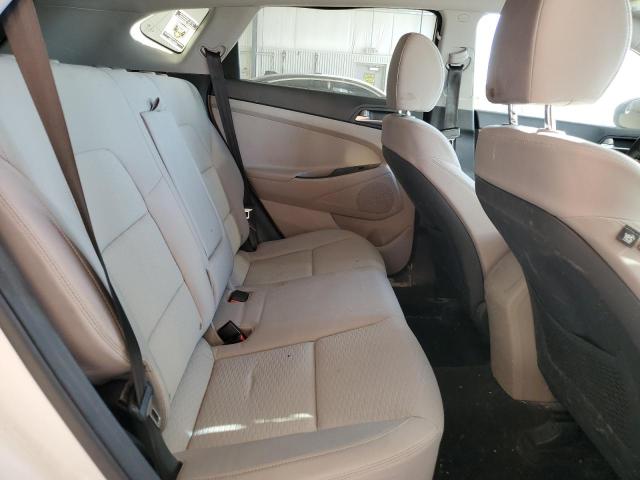 Photo 11 from auction – 2021 HYUNDAI TUCSON SE with VIN KM8J2CA47MU296355