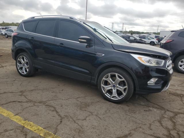 Photo 4 from auction – 2017 FORD ESCAPE TIT with VIN 1FMCU9J9XHUB01565
