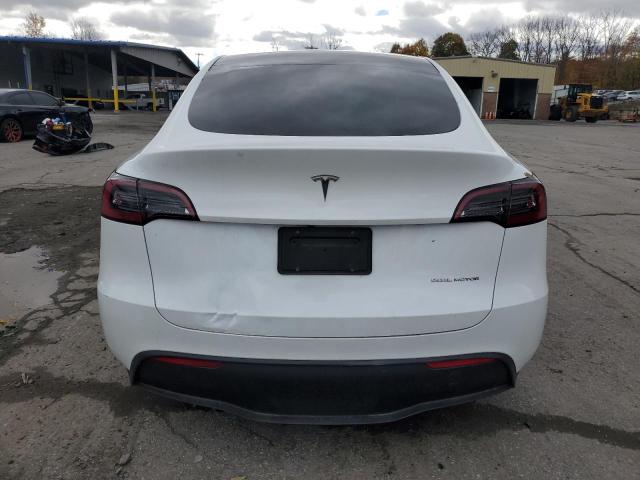 Photo 6 from auction – 2023 TESLA MODEL Y with VIN 7SAYGDEEXPA117686