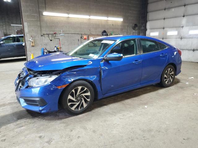 HONDA CIVIC EX 2018 with VIN 19XFC2F72JE205460 - Photo from auction