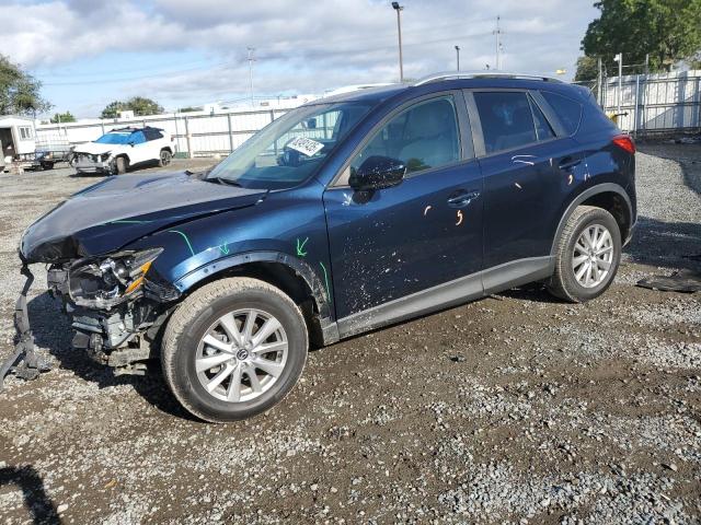 MAZDA CX-5 TOURING 2015 with VIN JM3KE4CY0F0454056 - Photo from auction