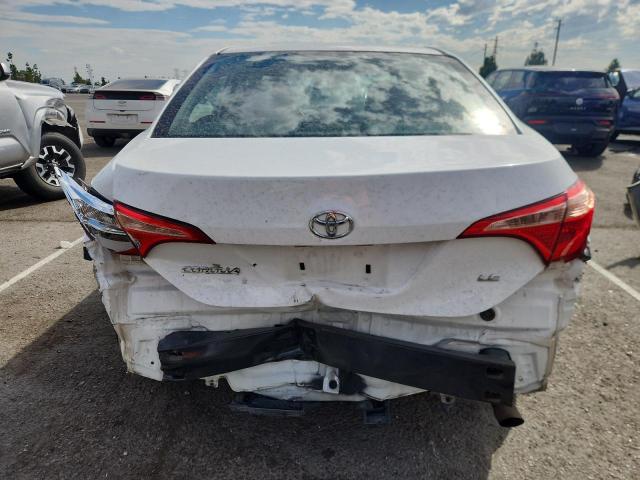 Photo 6 from auction – 2018 TOYOTA COROLLA L with VIN 5YFBURHE6JP854399