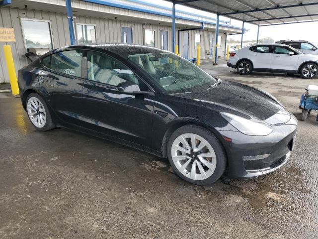Photo 4 from auction – 2023 TESLA MODEL 3 with VIN 5YJ3E1EA1PF457773