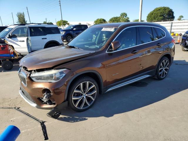 BMW X1 XDRIVE2 2016 with VIN WBXHT3C31GP881023 - Photo from auction