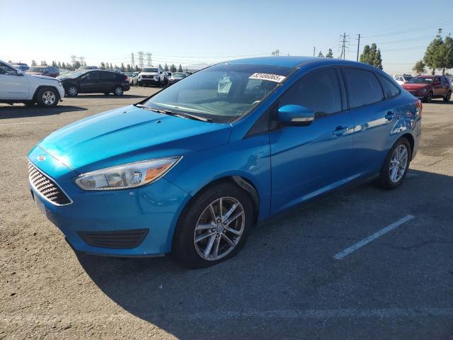 FORD FOCUS SE 2015 with VIN 1FADP3F28FL336306 - Photo from auction