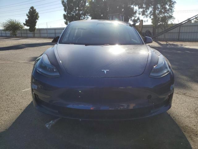 Photo 5 from auction – 2021 TESLA MODEL 3 with VIN 5YJ3E1EB3MF993127