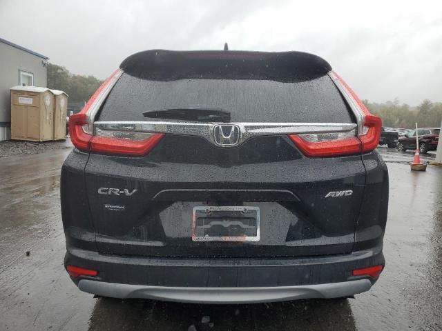 Photo 6 from auction – 2018 HONDA CR-V EX with VIN 7FARW2H51JE101671